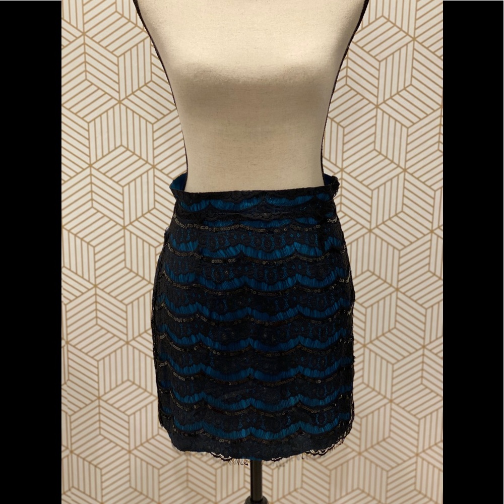 FRANCESCA’S Laced Overlay Mini Skirt